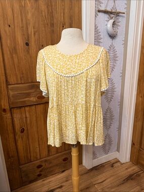 Yellow Floral Peplum Top with Pom Trim by